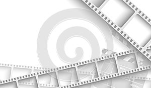 Abstract background with white film strip frame and clapper-board isolated on white background. Design template cinema with space