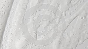 Abstract background white soapy foam texture. Shampoo foam with bubbles