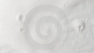 Abstract background white soapy foam texture. Shampoo foam with bubbles