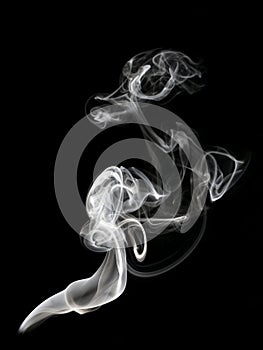 Abstract beautiful art. White smoke from the incense isolated on