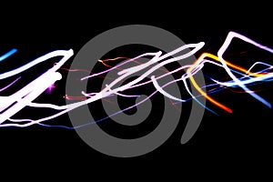 Abstract beautiful light painting photography, waves abstract light on black background