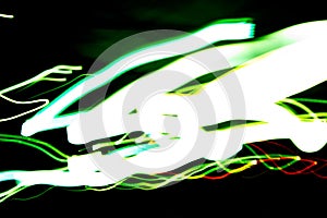 Abstract beautiful light painting photography, waves abstract light on black background