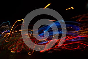 Abstract beautiful light painting photography, waves abstract light on black background