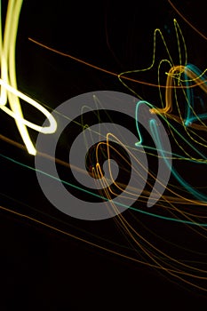 Abstract beautiful light painting photography, waves abstract light on black background