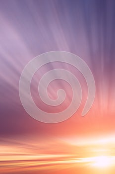 Abstract Beautiful pink and purple cirrus clouds and sunset sun