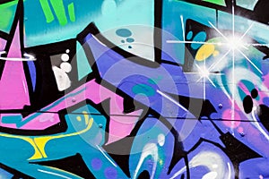 Abstract beautiful street art colorful graffiti style closeup. Detail of a wall. Can be useful for backgrounds. Moder