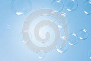 Abstract Beautiful Transparent Blue Soap Bubbles Background. Soap Sud Bubbles Water.