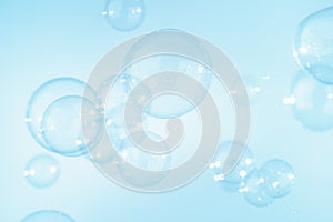 Abstract Beautiful Transparent Blue Soap Bubbles Background. Soap Sud Bubbles Water.