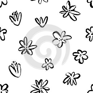 Abstract black doodle pattern with floral motif.