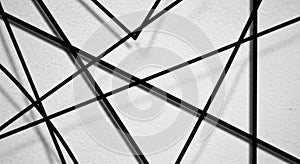Abstract Black Lines Intersecting on Textured White Surface
