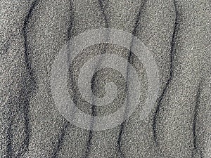 abstract black sand background. dark sand waves