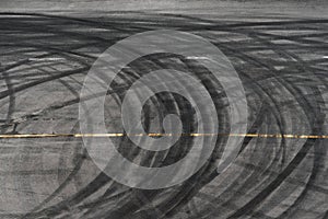 Abstract of Black tire wheels caused by Drift car on the road photo