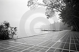 A blurry dreamy view of a grid background in a calming space in black and white film negative photo
