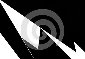 Abstract black and white image featuring sharp triangular shapes.
