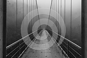 Black and white footbridge / bridge on a rainy, foggy day - vietnam