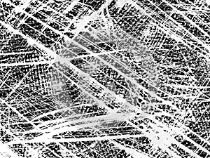 Abstract black and white texture created by intersecting lines on a surface in an artistic design