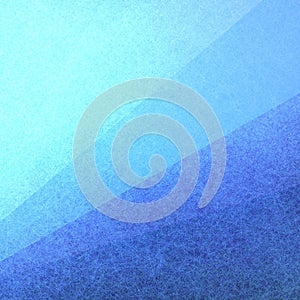 Abstract blue background with diagonal stripes in textured materia
