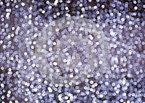 Abstract blue background with silver sparkles. Blur