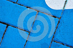 Abstract:  Blue bricks with white oval in top right