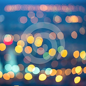 abstract blue circular bokeh background, city lights with horizon, instagram toned effect, closeup