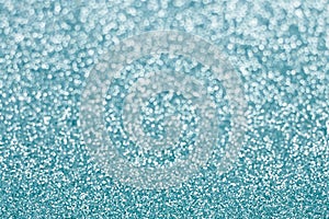 Abstract blue glitter background. Sparkle blue bokeh christmas background