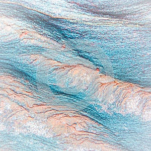 Abstract blue, gray, orange and green background - layers of rocks