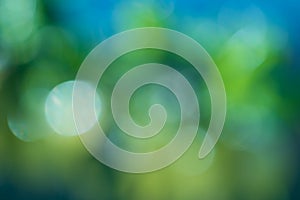 Abstract blue and green circular bokeh background