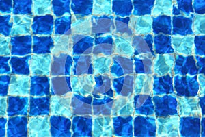 Abstract Blue mosaic tiles of swimming pool water for background