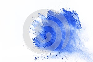 Abstract of blue powder explosion on white background. Blue powder splatted isolate. Colored cloud. Colored dust explode. Paint Ho