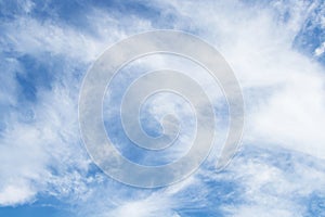 Abstract Blue sky background with tiny surrounded by small cloud.