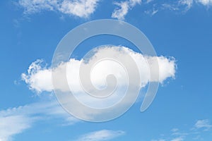 Abstract Blue sky background with tiny white clouds.