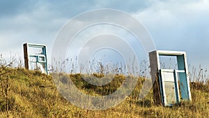 Abstract blue sky background with two window on the autumn fields. Conceptual business illustration