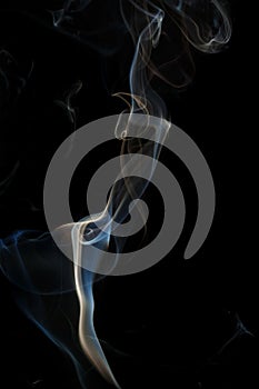 Abstract blue smoke from aromatic sticks.