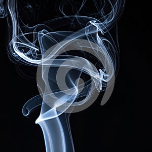 Abstract Blue Smoke Swirls on Black Background