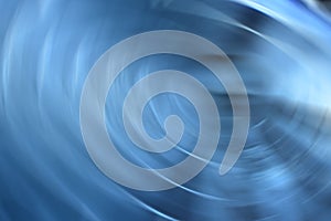 Abstract blue spinning lights line background