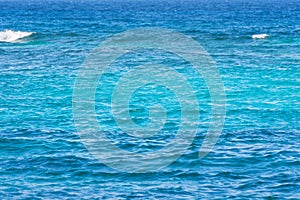 Abstract blue water background. Sea, ocean turquoise blue water.