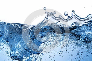 Abstract blue water wave splash with bubbles, isolated on white