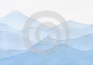 Abstract, blue, watercolor background with a landscape of mountains.