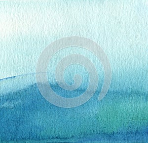 Abstract blue watercolor painted background.