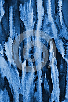 Abstract blue watercolor on paper texture as background. Christmas background or New Year background design