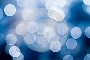 Abstract blue and white circular bokeh background