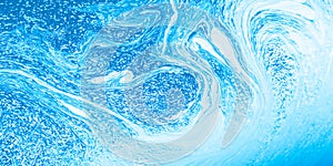 Abstract blue and white swirling water