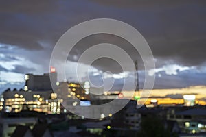 Abstract blur aerial view city on twilight color sky and clouds cityscape autumn sunrise background