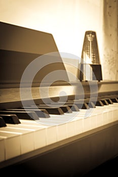 Abstract and blur background. Closeup piano keyboard with metron