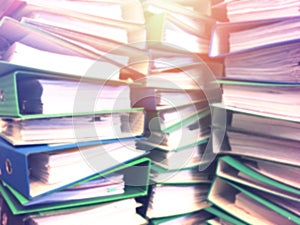 Abstract blur background of file stack at office