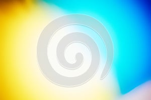 Abstract blur background. Gradient yellow, white and blue background