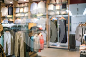 Abstract blur of beautiful clothes store and shopping mall inter