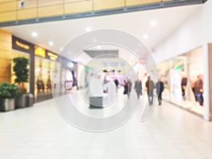 Abstract blur and bokeh beautiful luxury shopping mall and department store interior for background. Blurred background with peopl