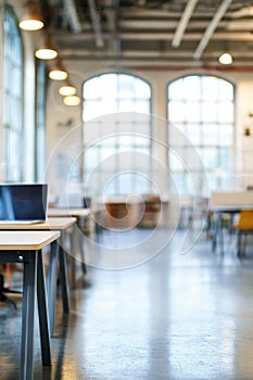 Abstract Blur Coworking Space with Desks and Laptops photo