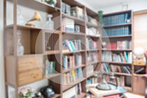 Abstract blur defocused background of books on bookshelf in library, Education and scholarship opportunity.World book day concept